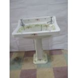 A vintage Shelvas pedestal sink with transferred printed floral decoration A/F
