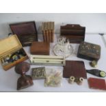 A collection of various items including wooden boxes, instrument set, microscope, binoculars, etc