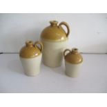 Three stoneware cider flagons