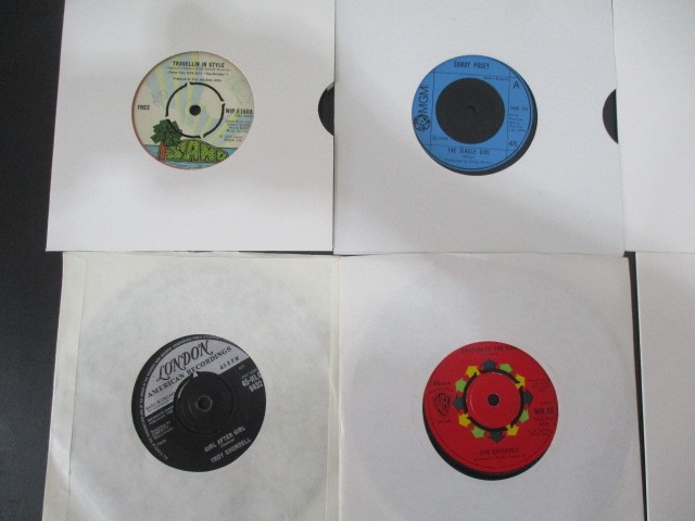 A collection of 7" vinyl singles including The Beatles, Robert Plant, The Jam, Free, Madonna, - Image 16 of 42