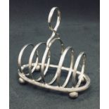 A small silver toast rack. Weight 59.8g