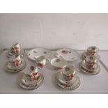 A porcelain 12 place tea set