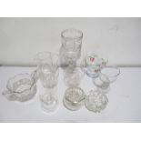 A collection of glassware including a celery vase