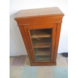 An oak display cabinet - key in office