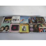 A collection of 7" vinyl singles including Madonna, U2, Rainbow, ELO, Elton John, Tina Turner etc