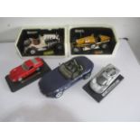 Five Burago model cars