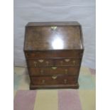 A Queen Anne walnut bureau of small size (69cm wide)