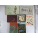 A collection of postcards, cigarette cards etc