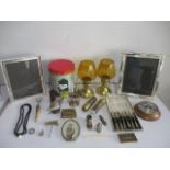 A collection of various items including lighter, spoons, silver plated items, brooches, picture