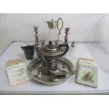 A collection of silver plated items including claret jug, candlesticks etc. along with 5 Beatrix