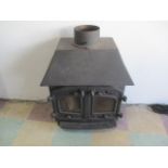 A cast iron Villager log burner, new part included.