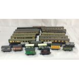 A collection of railway carriages, rolling stock etc