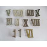 A collection of cast iron Roman numerals