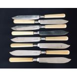 A set of eight silver bladed fish knives