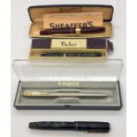 Four vintage fountain pens- Parker Premiere, Parker Vacuumatic, one other and a Sheaffer