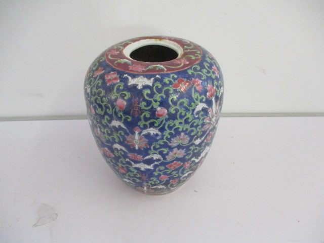 A Chinese vase with character mark to base, hairline crack