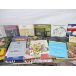 A collection of Classical 12" vinyl records including Mozart, Joseph Haydn, Beethoven, Pavarotti,