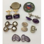 A pair of silver and enamelled cufflinks, along with various other cufflinks, enamelled badges etc