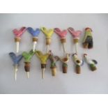A collection of novelty bottle stoppers in the form of cockerels, hens, ducks etc