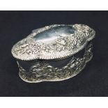 A shaped hallmarked silver trinket box. Chester 1898 by J & W Deakin