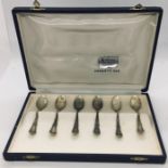 A cased set of continental silver (800) coffee spoons