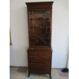 A narrow reproduction display cabinet on chest of drawers with leather writing shelf, 63 cm max