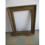 A large antique gilt frame - A/F