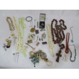 A collection of costume jewellery etc. including silver, amber necklace etc.