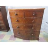 A Victorian bow fronted chest of five drawers