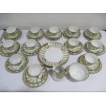 A Noritake part tea set including twelve trios, sugar bowl, creamer jug etc