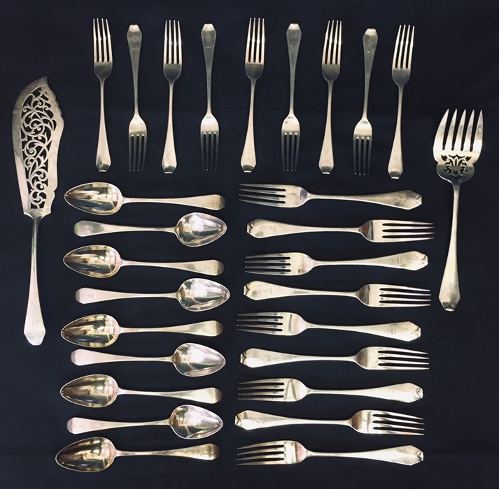 A suite of hallmarked silver cutlery consisting of 9 spoons, 9 dinner forks, 9 forks and fish