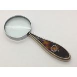 A silver and tortoiseshell handled magnifying glass. (Birmingham 1921)