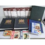 A collection of Stanley Gibsons stamp collectors albums and refill packs, along with three stamp