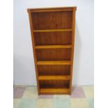 A pine freestanding shelf unit