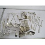 A collection of silver plated cutlery including serving ladles etc.