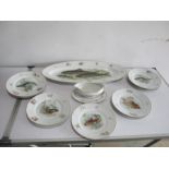 A part set of continental fish plates and platter etc. decorated with four different images ( 13)