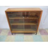 A Gibbs mid century cabinet with two glass sliding doors
