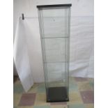 An Ikea glass display cabinet ( 1 foot A/F)