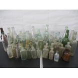 A collection of various glass bottles