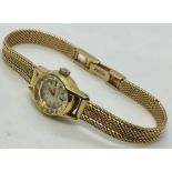 A ladies Helios watch with an 18ct gold strap ( case gold plated), total weight 23.1g