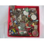 A collection of interesting items to include medallions, badges, watch, compass etc.