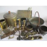 A collection of brass and copper items including a coal bin, candlesticks etc