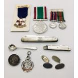 A "Women's Voluntary Service Medal", WWII miniature medals, silver medallion, 2 silver bladed