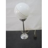An art deco chrome lamp with globe shape