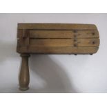 A vintage wooden football/supporters rattle
