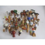 A collection of various vintage bottle stoppers.