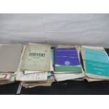 A large collection of sheet music.