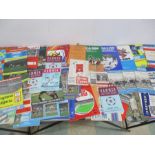 A collection of various football match day programmes including England internationals and English