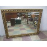 A gilt framed mirror, 93 cm x 118 cm