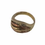 A 9ct two coloured gold dress ring, size O. Weight 4.9g